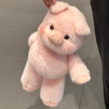 Niedliches laufendes Schwein-Stofftier